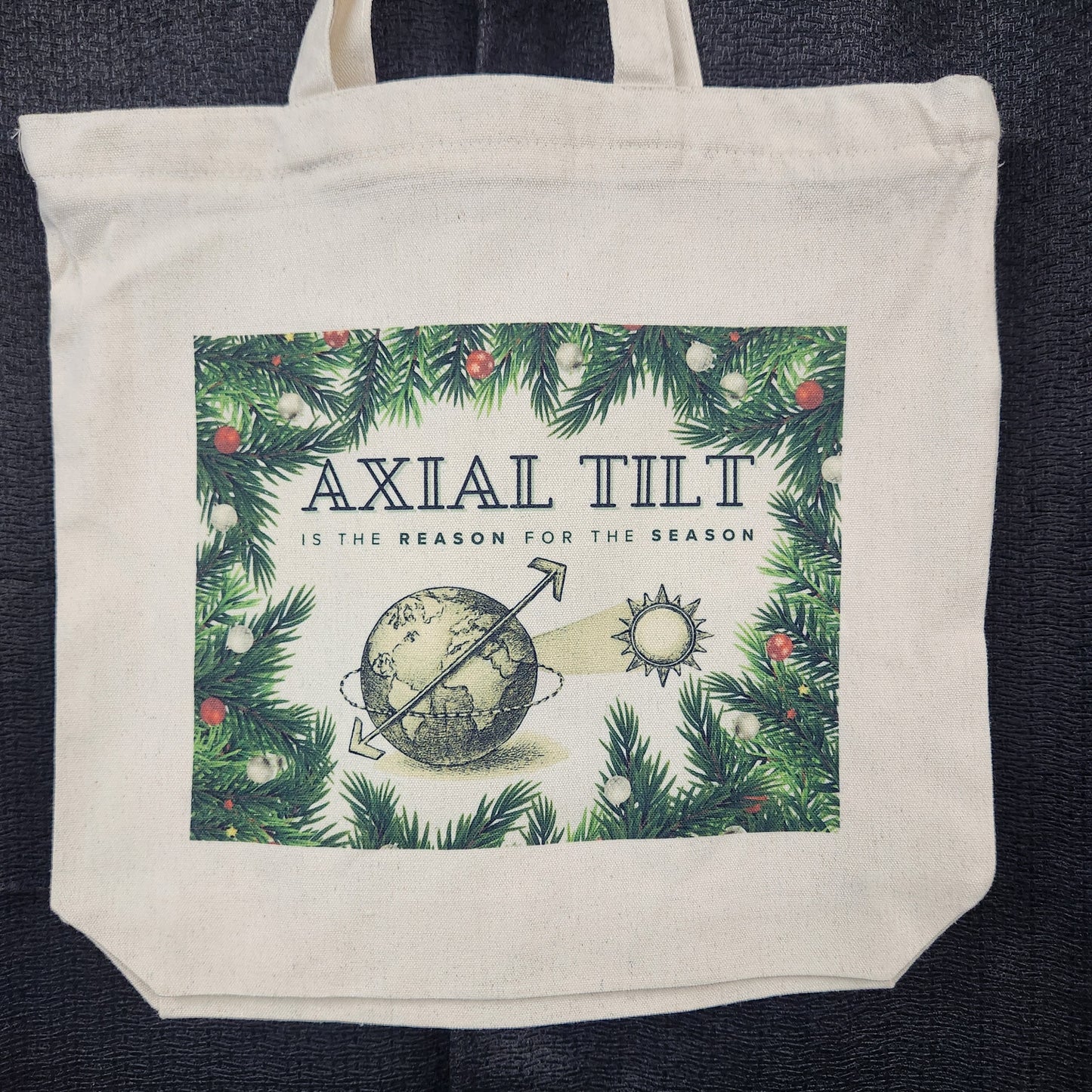 Axial Tilt is the Reason for the Season tote bag